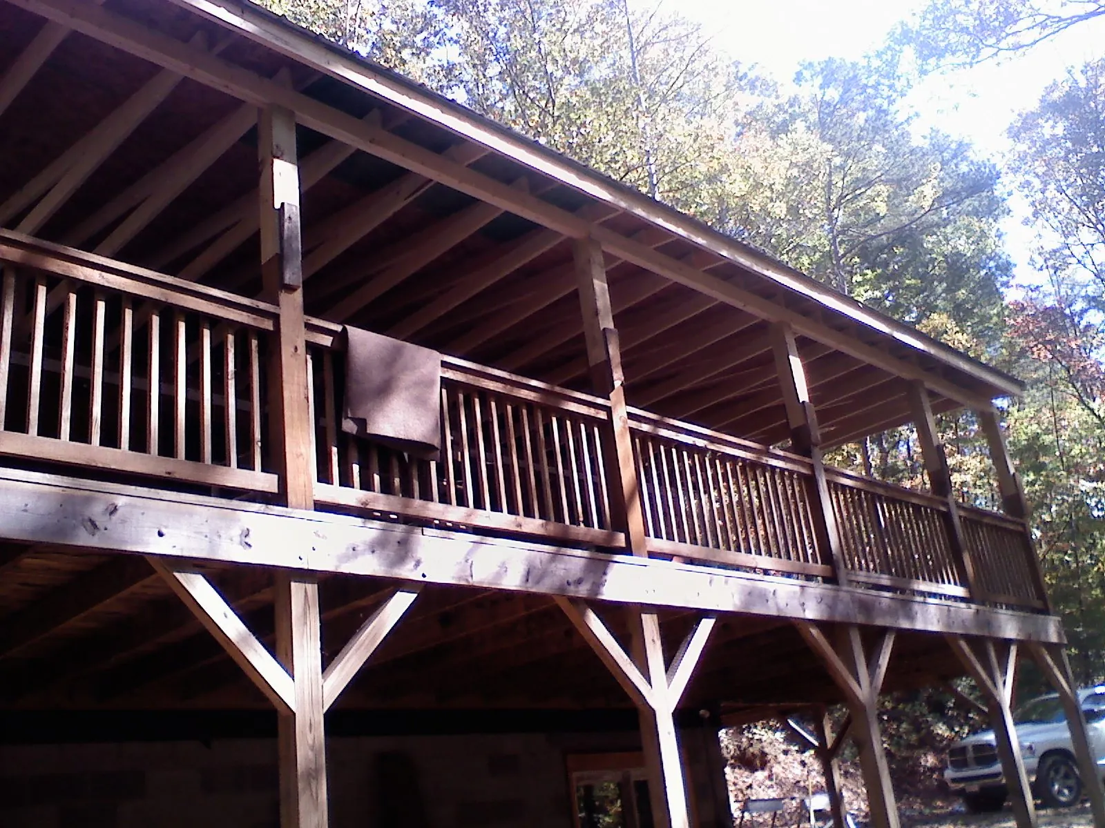 Timber framing under a new elevated porch and deck — Roof Leak Repair in Claryville by Roofing Brothers